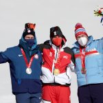 Gold medallist Matthias Mayer of Team Austria (C), Silver medallist Ryan Cochran-Siegle of Team United States (L) and Bronze medalist Aleksander Aamodt Kilde of Team Norway (R) pose during the Men's Super-G medal ceremony on day four of the 2022 Winter Olympics at National Alpine Ski Centre on Feb. 8, 2022, in Yanqing, China.