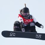 Chloe Kim of United States performs a trick on a practice run during the Women's Snowboard Cross Qualification on Day 5 of the 2022 Winter Olympics at Genting Snow Park on Feb. 9, 2022, in Zhangjiakou, China.