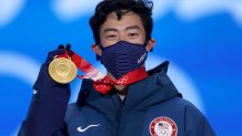 Nathan Chen of Team United States poses with his medal during the Men's Single Skating medal ceremony at the 2022 Winter Olympic Games, Beijing Medal Plaza, Feb. 10, 2022 in Beijing, China.