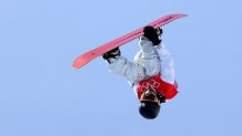 Ayumu Hirano in mid-air doing a trick