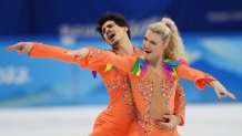 Piper Gilles and Paul Poirier of Team Canada perform during the Ice Dance Rhythm Dance event at the 2022 Winter Olympic Games at Capital Indoor Stadium, Feb. 12, 2022, in Beijing, China.
