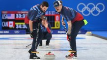 (L-R) John Landsteiner, John Shuster and Matt Hamilton of Team United States compete during the Men's Curling Round Robin Session against Team Canada on day 9 of the 2022 Winter Olympics at National Aquatics Centre on Feb. 13, 2022, in Beijing, China.