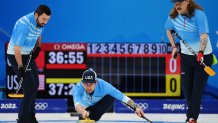 John Landsteiner, Christopher Plys and Matt Hamilton of Team United States compete against Team China during the Men's Curling Round Robin at the Beijing 2022 Winter Olympic Games, Feb .13, 2022 in Beijing, China.