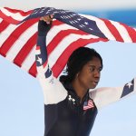 Erin Jackson of Team United States celebrates after winning gold at the 2022 Winter Olympic Games for the Women's 500m, at National Speed Skating Oval, Feb. 13, 2022, in Beijing.