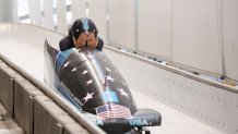Silver medallist Elana Meyers Taylor of Team United States celebrates during the Women's Monobob heat 4 on day 10 of 2022 Winter Olympics at National Sliding Centre on Feb. 14, 2022, in Yanqing, China.