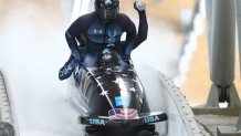 Frank Delduca, Carlo Valdes, James Reed and Hakeem Abdul-Saboor of Team United States react to their slide during the four-man Bobsleigh heat 4 on day 16 of 2022 Winter Olympics at National Sliding Centre on Feb. 20, 2022, in Yanqing, China.