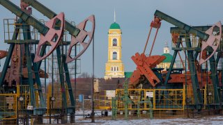 Oil pumping jacks in an oilfield near Neftekamsk, in Bashkortostan, Russia, on Nov. 19, 2020.