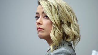 Amber Heard appears in the courtroom in the Fairfax County Circuit Courthouse in Fairfax, Va.
