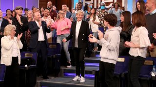 In this photo released by Warner Bros., talk show host Ellen DeGeneres, center, is applauded by the audience during the final taping of "The Ellen DeGeneres Show" at the Warner Bros. lot in Burbank, Calif.