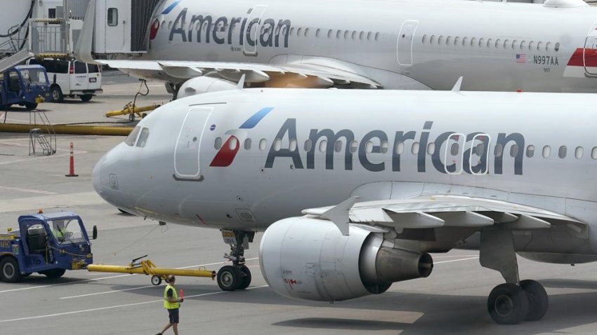 American Airlines passenger jets prepare for departure, Wednesday, July 21, 2021, near a terminal at Boston Logan International Airport, in Boston. Jurors in a civil lawsuit decided Wednesday, May 11, 2022, that American Airlines did not bear responsibility for an alleged sexual assault against a flight attendant by a celebrity chef who was hired by the airline as an independent contractor.