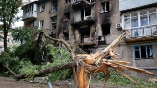 apartment building damaged during shelling in Donetsk