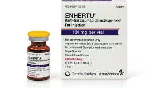 This undated photo provided by Daiichi Sankyo and AstraZeneca in June 2022 shows a vial and packaging for their Enhertu, an antibody-chemotherapy drug