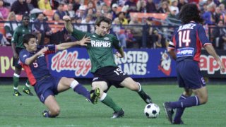 19 May 2001: Scott Vermillion #19 of the Colorado Rapids dribbles against the defense of the New England Revolution at Mile High Stadium in Denver, Colorado. The Rapids lost 1 - 0 to the Revolution.