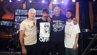 (L-R) Bassist Flea, Singer Anthony Kiedis, Drummer Chad Smith and Guitarist John Frusciante of the Red Hot Chili Peppers