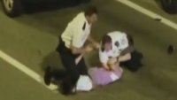 Police Seek to Fire Officer Caught on Video Smashing Handcuffed Man's Face Into Street