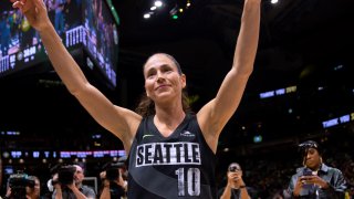 Seattle Storm guard Sue Bird waves to fans after the Storm lost to the Las Vegas Aces and were eliminated from the WNBA playoffs, Sept. 6, 2022, in Seattle. The Aces won 97-92.