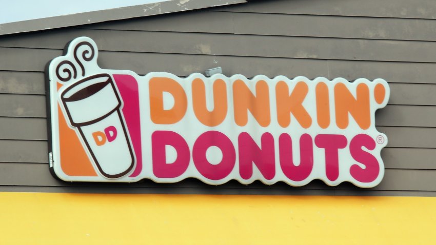 An image of the sign for Dunkin' Donuts as photographed on March 16, 2020, in Levittown, New York.