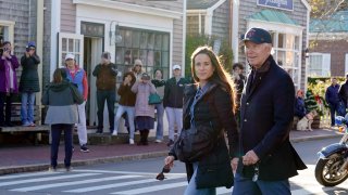 President Joe Biden walks with his daughter Ashley Biden as they visit shops in Nantucket, Mass., Saturday, Nov. 26, 2022.