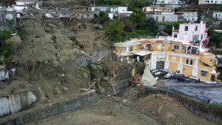 An aerial view of damaged houses after heavy rainfall triggered landslides