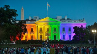 the White House illuminated with rainbow colors