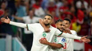 Youssef En-Nesyri of Morocco celebrates after scoring the team's second goal with teammates during the FIFA World Cup Qatar 2022 Group F match between Canada and Morocco at Al Thumama Stadium, Dec. 1, 2022, in Doha.