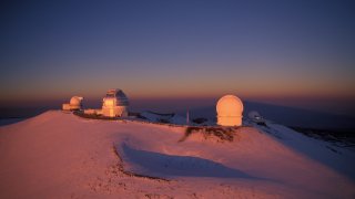 FILE - 1999: The two Keck telescopes, Keck I and II, share space at the summit of dormant volcano Mauna Kea, the highest peak in the Pacific at 13,800 feet, 1999 on the Big Island of Hawaii.