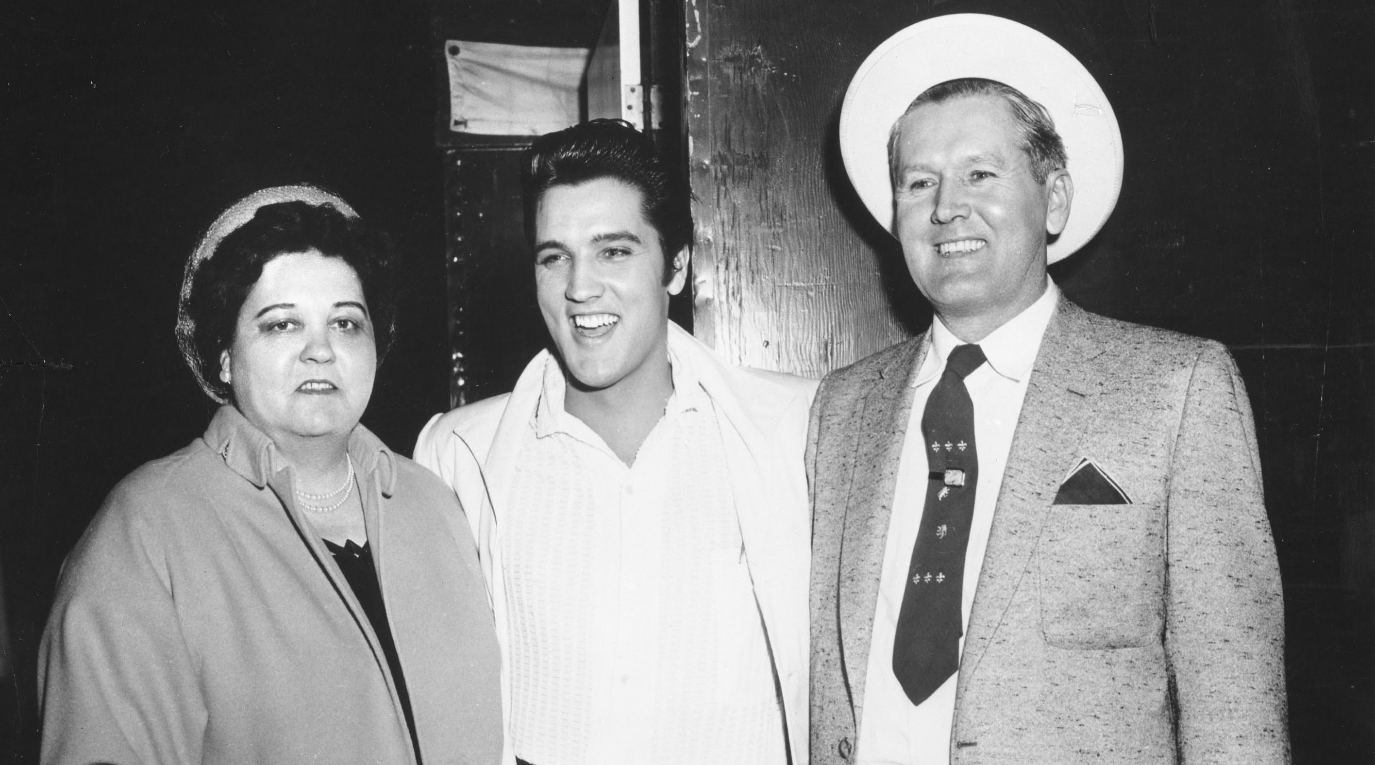 Elvis Presley with his parents