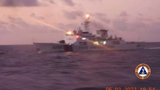 This photo provided by the Philippine Coast Guard shows a Chinese coast guard ship in the disputed South China Sea