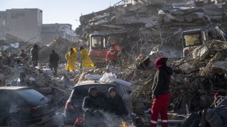 Personnel conduct search and rescue operations following 7.7- and 7.6-magnitude earthquakes that hit on Feb. 6, 2023, in Turkey.