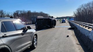 A crashed pickup truck on the Maine Turnpike near Biddeford on Friday, Feb. 3, 2023. The crash left the pickup driver dead, public safety officials said.