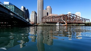 This Nov. 2022 file photo shows the skyline of the Boston's Financial District from across Fort Point Channel.
