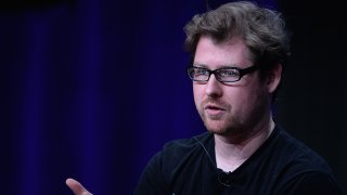 FILE - Justin Roiland speaks onstage during Turner Broadcasting's 2013 TCA Summer Tour at The Beverly Hilton Hotel on July 24, 2013, in Beverly Hills, California.