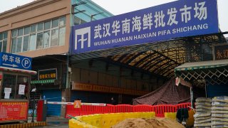FILE - The Huanan Seafood Wholesale Market sits closed in Wuhan in central China's Hubei province on Jan. 21, 2020.