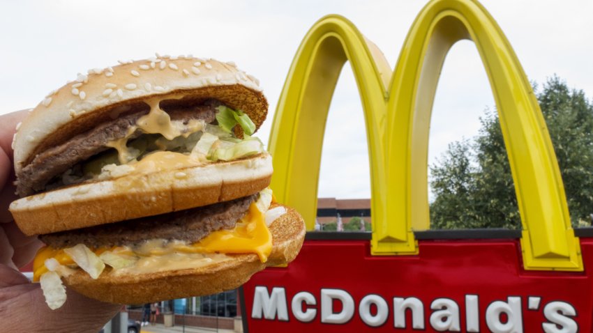 A McDonald’s Big Mac, their signature sandwich is held up near the golden arches at a McDonalds’s Aug. 10, 2015, in Centreville, Va.