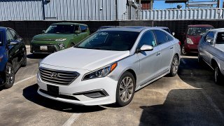 A Hyundai sedan sits in the parking lot of East Bay Tow Inc., where Attorney General Rob Bonta held a news conference, April 20, 2023, in Berkeley, Calif., about the surge in thefts of KIA and Hyundai vehicles.