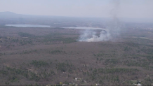 A brush fire burning in Northboro, Massachusetts, on Friday, April 14, 2023.