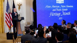 President Joe Biden speaks before a screening of the series "American Born Chinese" in the East Room of the White House in Washington.