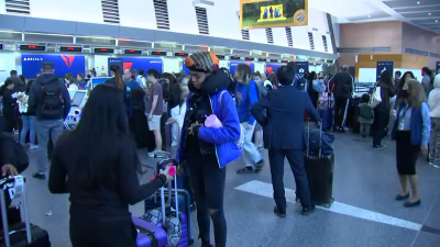 Snowstorm causes delays and cancellations at Logan