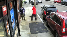 A still from surveillance video of a daylight shooting in Boston's Roxbury neighborhood on Wednesday, May 24, 2023. No one was hurt.