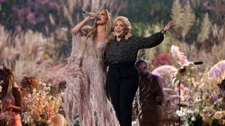 Jennifer Lopez and her mom, Guadalupe Rodríguez, perform onstage during Global Citizen VAX LIVE: The Concert To Reunite The World at SoFi Stadium in Inglewood, California.,