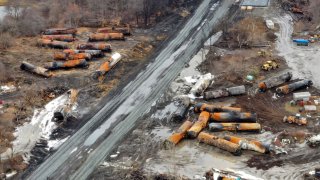 Cleanup efforts continue on portions of a Norfolk Southern freight train that derailed in East Palestine, Ohio, Feb. 9, 2023.