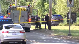 Investigators at the scene of a crash that killed a 16-year-old high school student from Palmer, Massachusetts, on Tuesday, June 13, 2023.