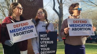 Abortion rights advocates gather in front of the J Marvin Jones Federal Building and Courthouse in Amarillo, Texas, on March 15, 2023.