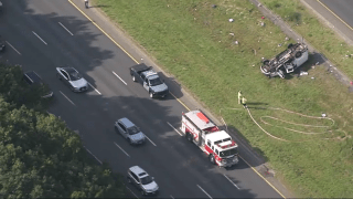 A crashed van in the median of I-95 in the Danvers/Boxford, Massachusetts, area on Friday, July 28, 2023.