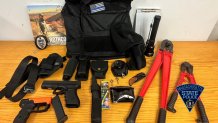 Items seized from a man who was arrested Sunday, July 23, in Revere, Massachusetts, for allegedly impersonating a police officer.