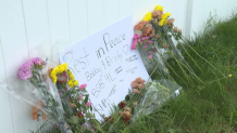 The memorial set up to honor 17-year-old Robert Stocker, of Woburn, and 20-year-old Brady Petrucci, of Raynham, who died in a dirt bike crash Saturday in Wareham, Massachusetts.