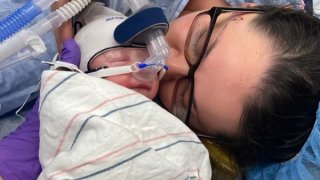 Angela Mercer and her baby boy, Aycen Hart, shortly after she gave birth at Brigham and Women’s Hospital