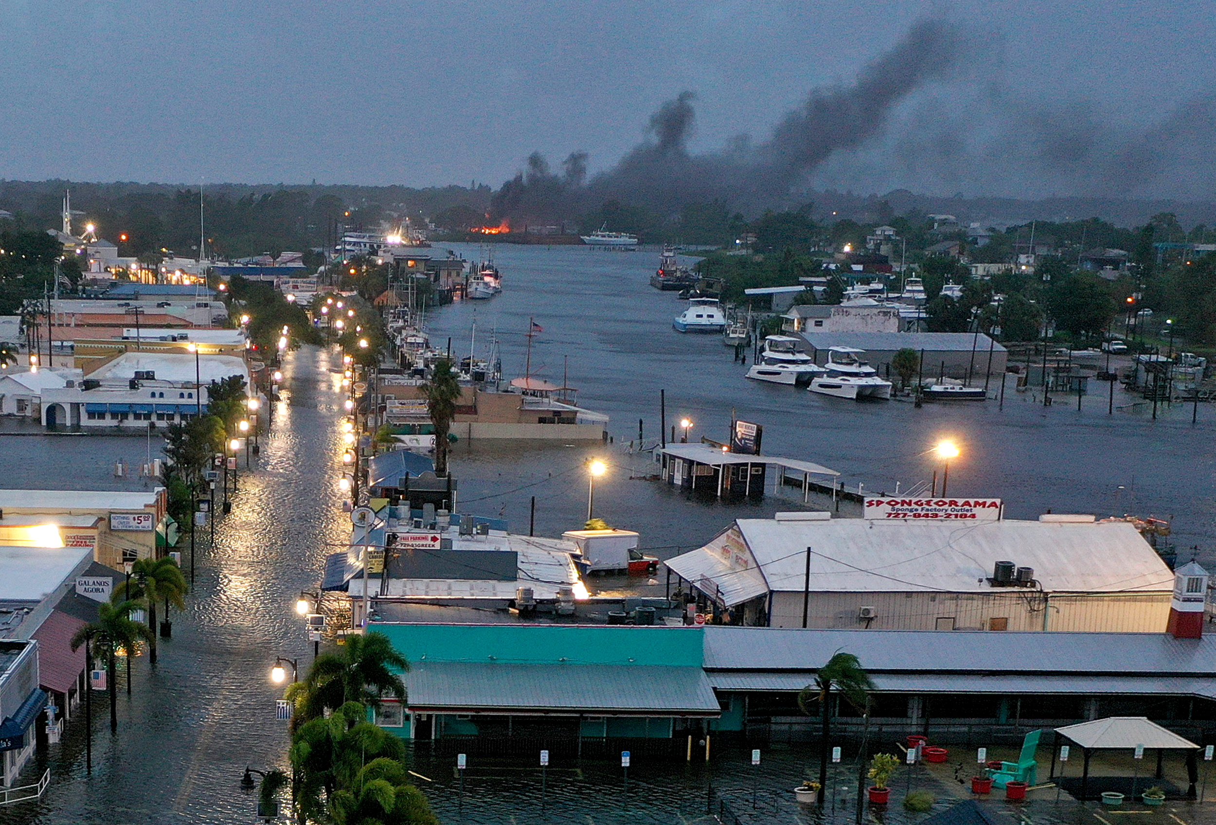 Flood waters inundate downtown after Hurricane Idalia passed offshore, Aug. 30, 2023, in Tarpon Springs, Florida. The storm made landfall as a category 3 storm.