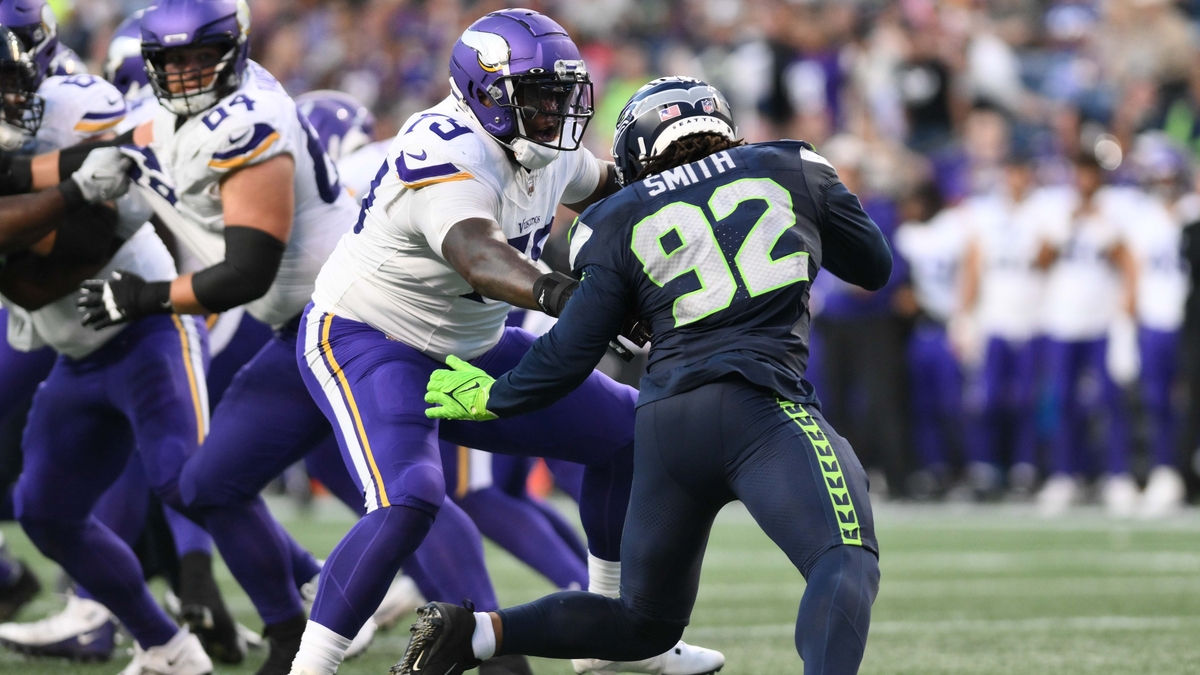 Aug 10, 2023; Seattle, Washington, USA; Minnesota Vikings offensive tackle Vederian Lowe (79) blocks Seattle Seahawks linebacker Tyreke Smith (92) during the game at Lumen Field. Mandatory Credit: Steven Bisig-USA TODAY Sports (New England Patriots) NFL