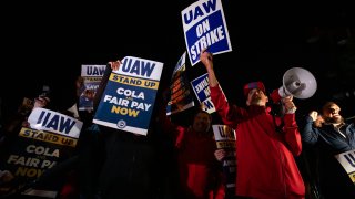 Supporters cheer as United Auto Workers members go on strike at the Ford Michigan Assembly Plant on September 15, 2023 in Wayne, Michigan.